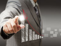 man pointing to rising graph 