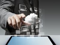 Hand pointing to cloud above tablet