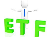 Man standing behind a green etf sign