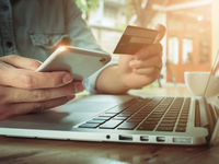 A man on the brink of purchasing something online