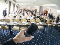 Public Speaker and Microphone