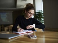 Woman Looking at her Watch