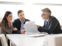 Young Couple with Advisor