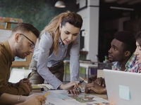 Woman Leading a Meeting