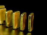 Gold ETFs Stumble as Traders Weigh Omicron, Fed Actions